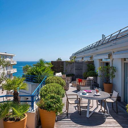 فندق مارتينيز في ذا أنبوند كولكشن باي حياة كان المظهر الخارجي الصورة A rooftop terrace in Nice, France