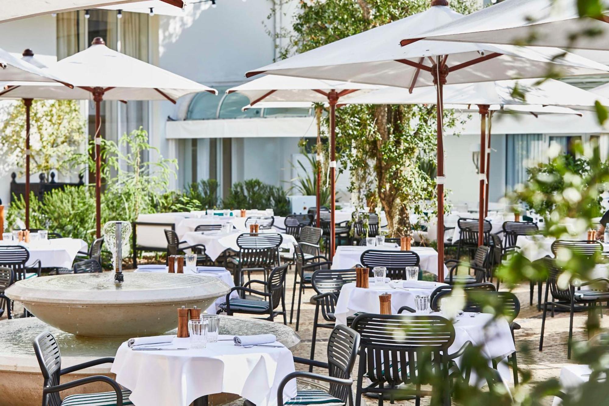 فندق مارتينيز في ذا أنبوند كولكشن باي حياة كان المظهر الخارجي الصورة The Terrace at the Four Seasons Hotel